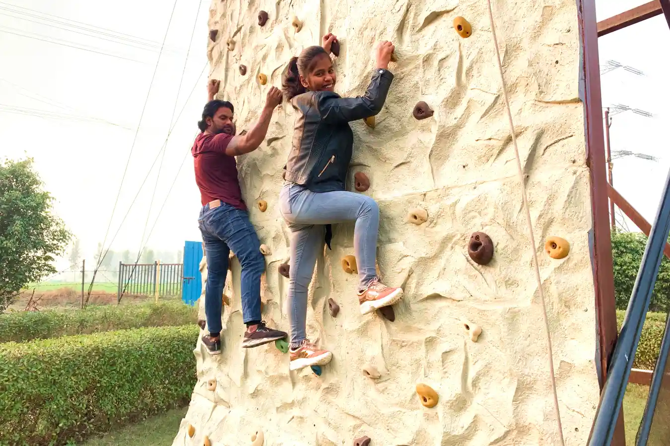 Kids on school trip doing archery and adventure challenges